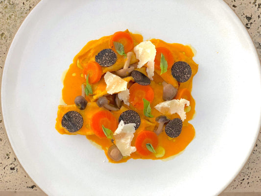 Rye Agnolotti with Carrot, Black Truffle, and Orange