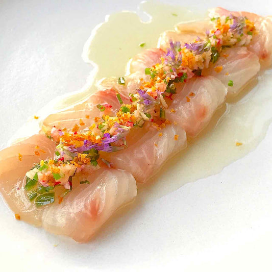 Kampachi sashimi with anise hyssop and jalapeño